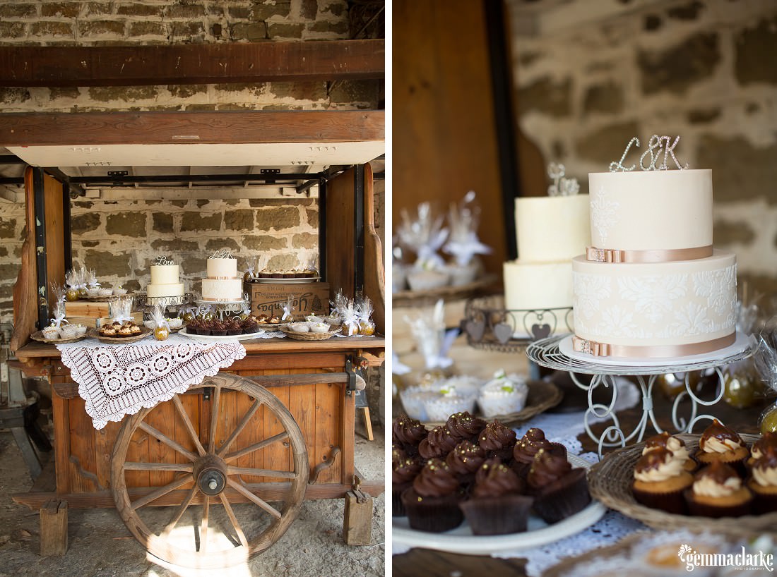 Desserts and two two-tiered white wedding cales on a wooden cart - Gledswood Homestead Wedding
