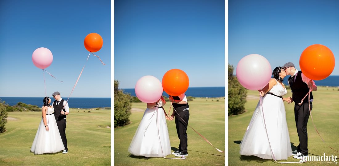A bride and groom posing with big brightly coloured balloons – St Michael's Golf Club Wedding