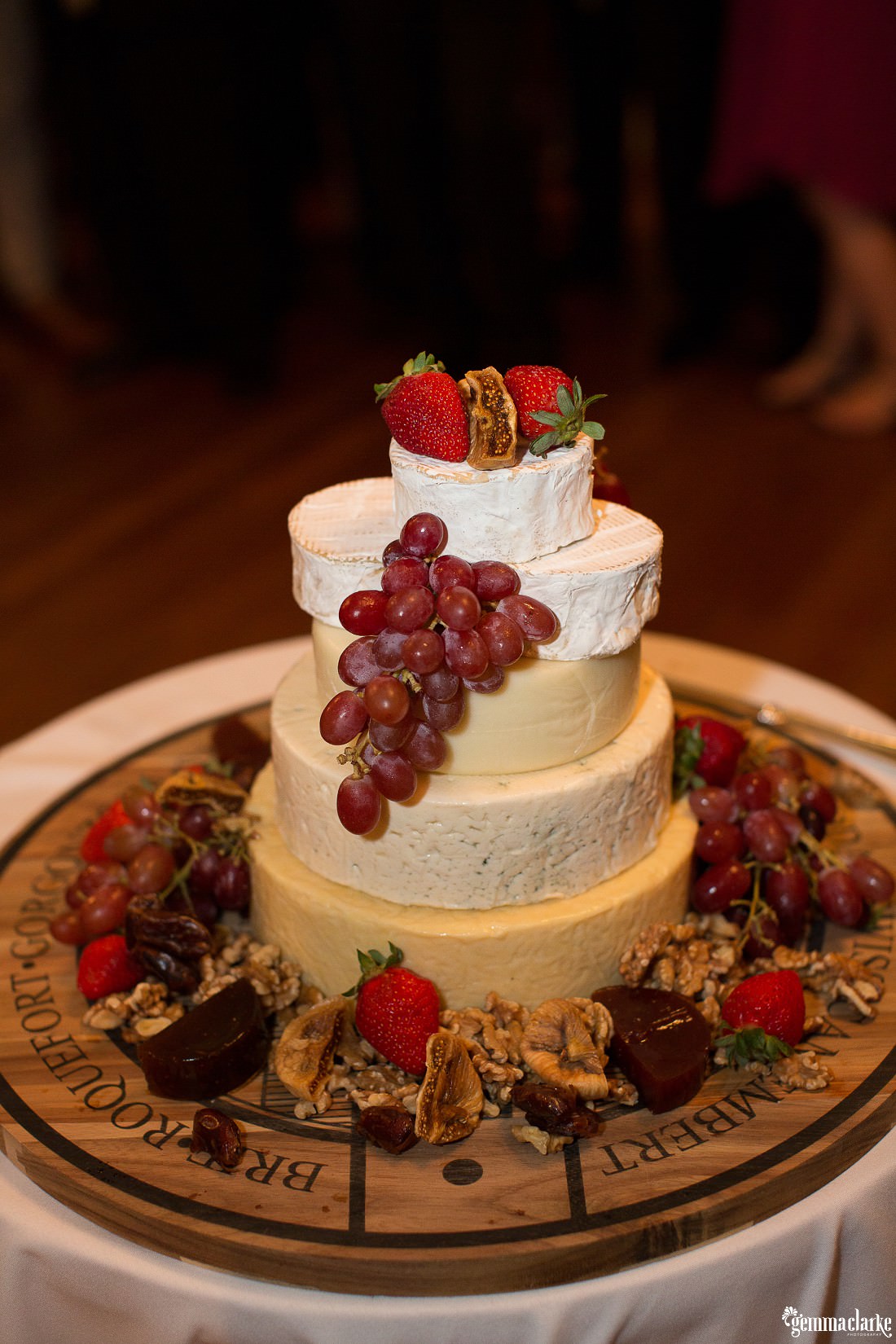 A five tier cheese "cake" dressed with fruit - Rainy Athol Hall Wedding