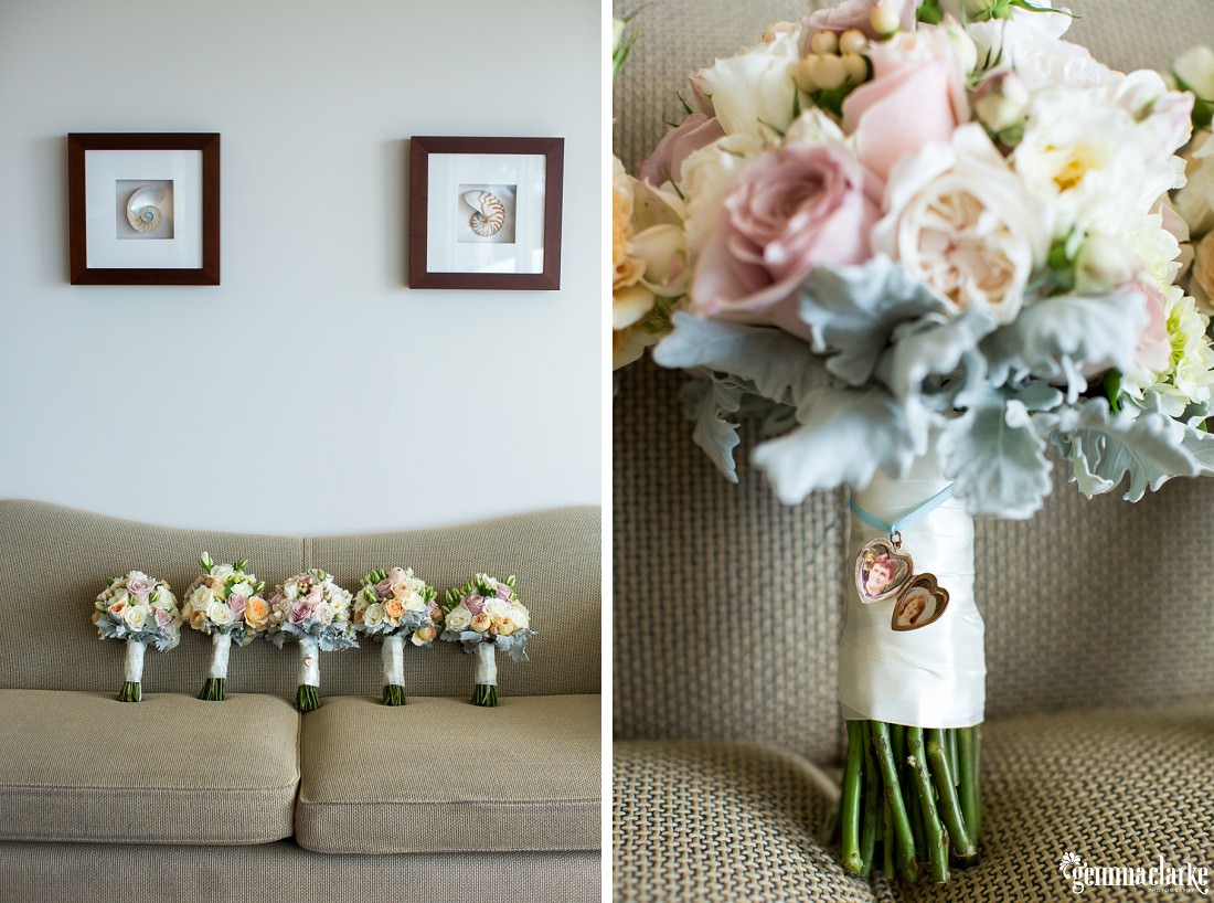 Give lightly coloured floral bouquets lined up on a couch and a closeup of a love heart shaped locket tied around one of the bouquets with pictures of people inside