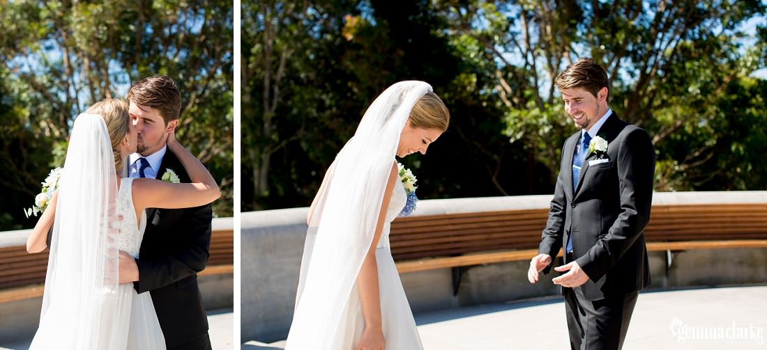 A bride and groom share a kiss after seeing each other for the first time on their wedding day