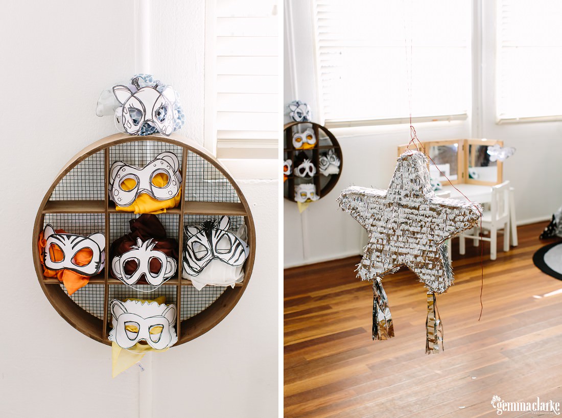 Handmade Animal masks for the children to try on and a photo of the star shaped pinata