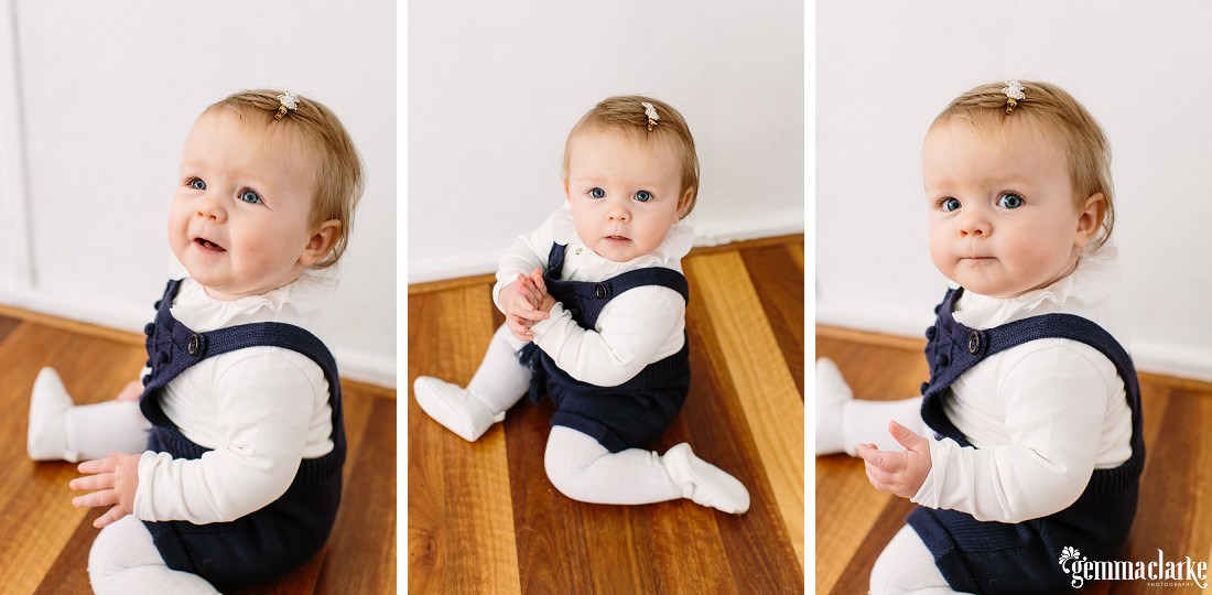 A series of three portraits of Florence who is nine months old and she is wearing navy outfit with a sweet white blouse underneath with a frill on it.