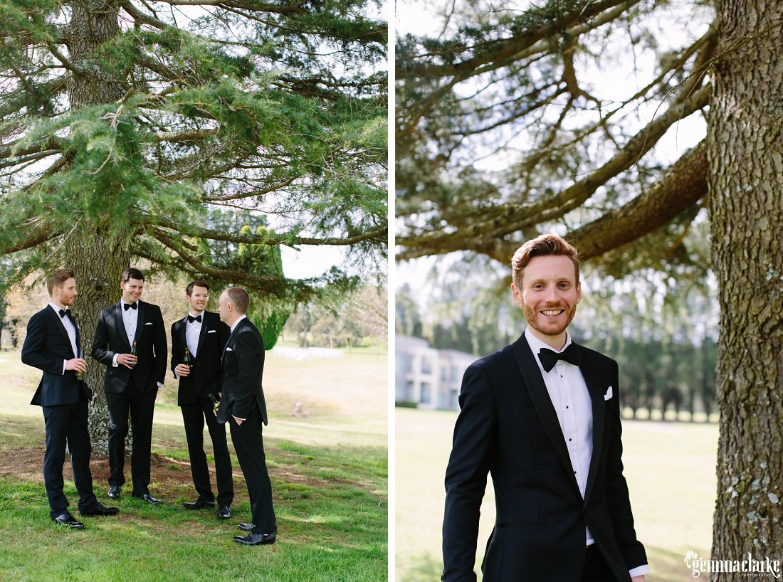 A groom and his groomsmen enjoying a beer under a tree