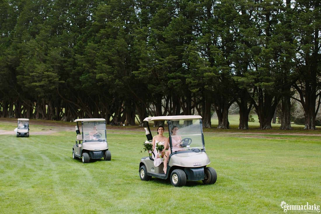 A bride and her bridesmaids arriving in golf carts