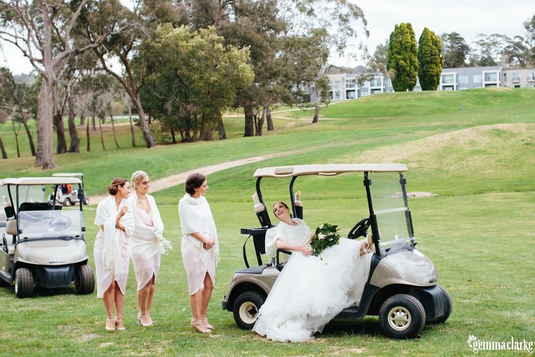 A bride relaxing in a golf cart