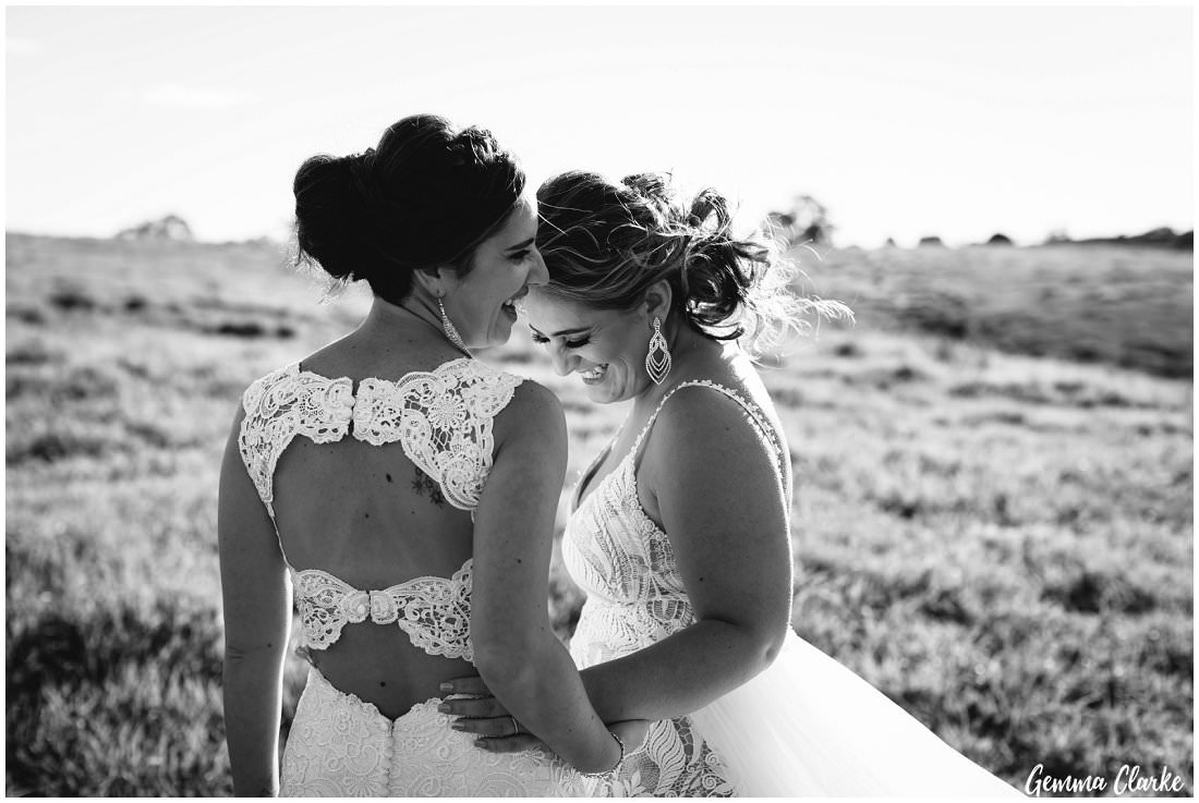 My favourite photo from the day, these two brides enjoy a candid moment laughing at their Ottimo House Wedding