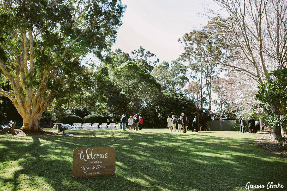 A lovely Welcome sign managed to stay upright at this windy Rhododendron Garden ceremony - winter Wollongong Wedding