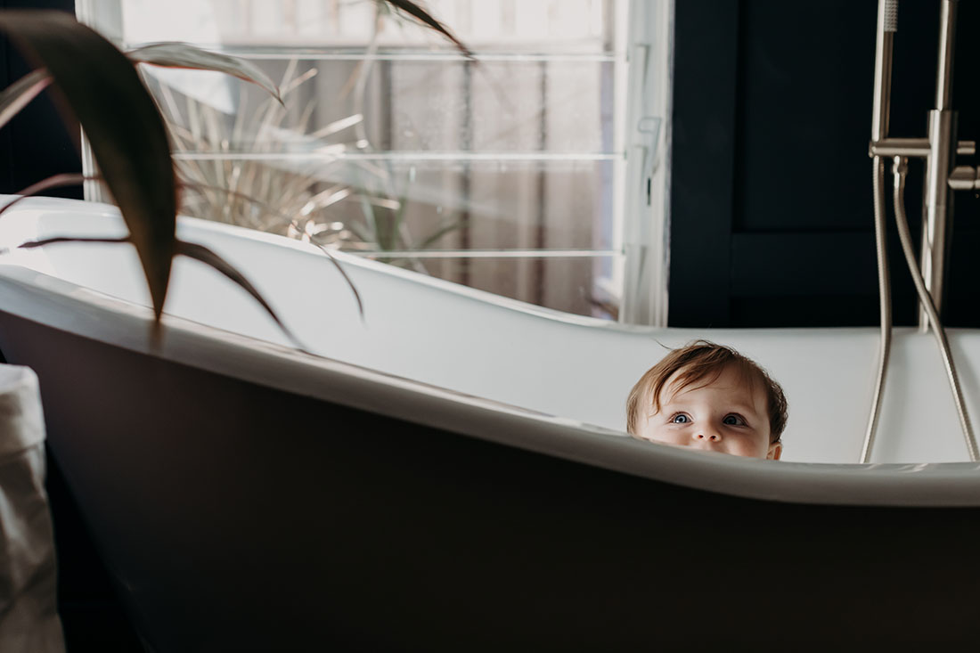 Antique Bath Photoshoot with 9 month old baby with cheeky looks